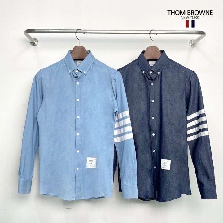 Read more about the article 톰브라운 사선 완장 데님 셔츠