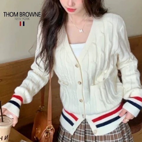Read more about the article 톰브라운 여성 끝 삼선 꽈배기 니트 가디건