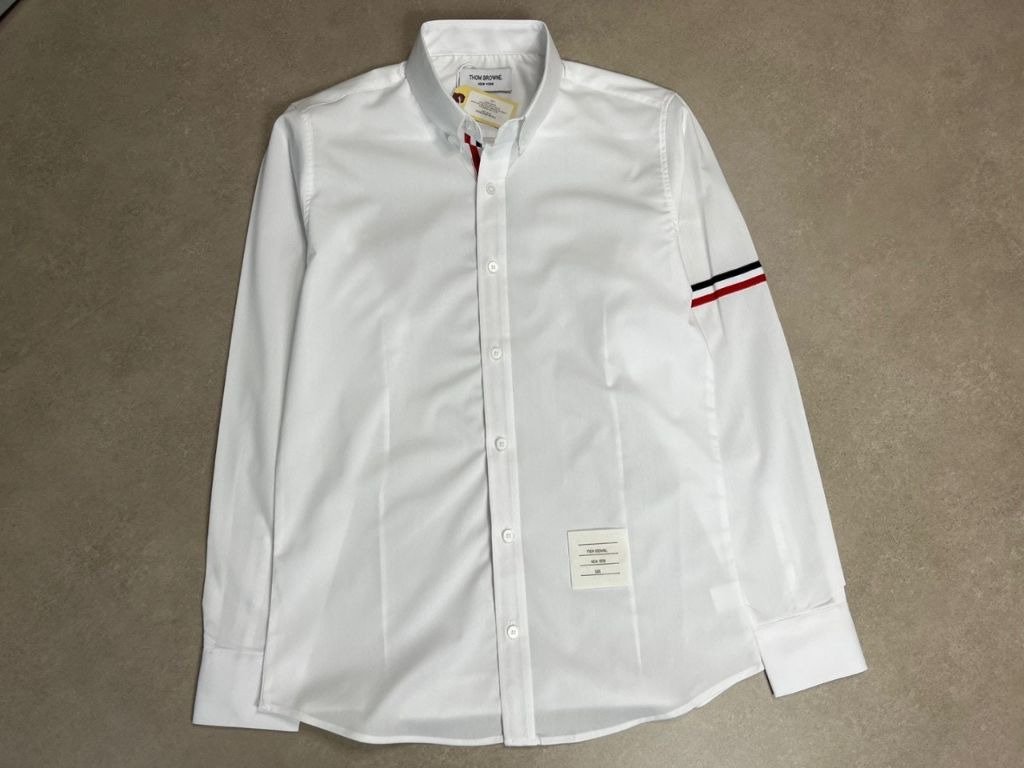 Read more about the article 톰브라운 암밴드 셔츠