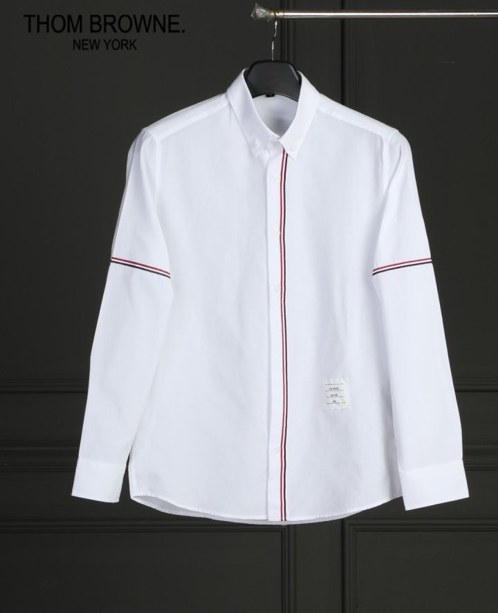 Read more about the article 톰브라운 옥스퍼드 팔 삼선 로고 포인트 셔츠