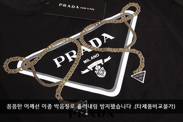 Read more about the article 프라다 사슬 고길 패턴 삼각 로고 맨투맨