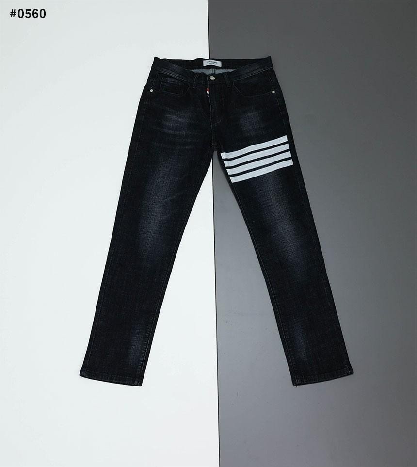 Read more about the article 톰브라운 돌핀 워싱 사선 흑청 청바지