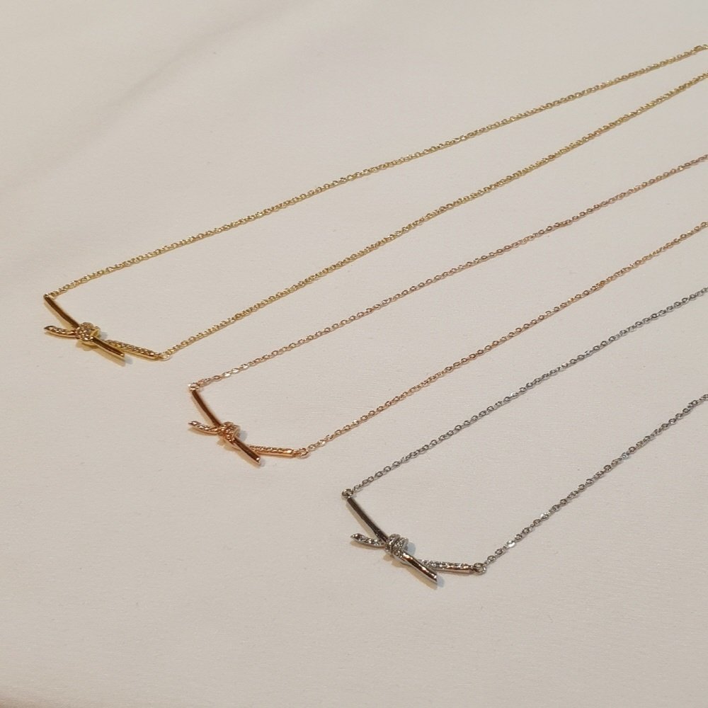 You are currently viewing 티파니 큐빅 매듭 노트 목걸이